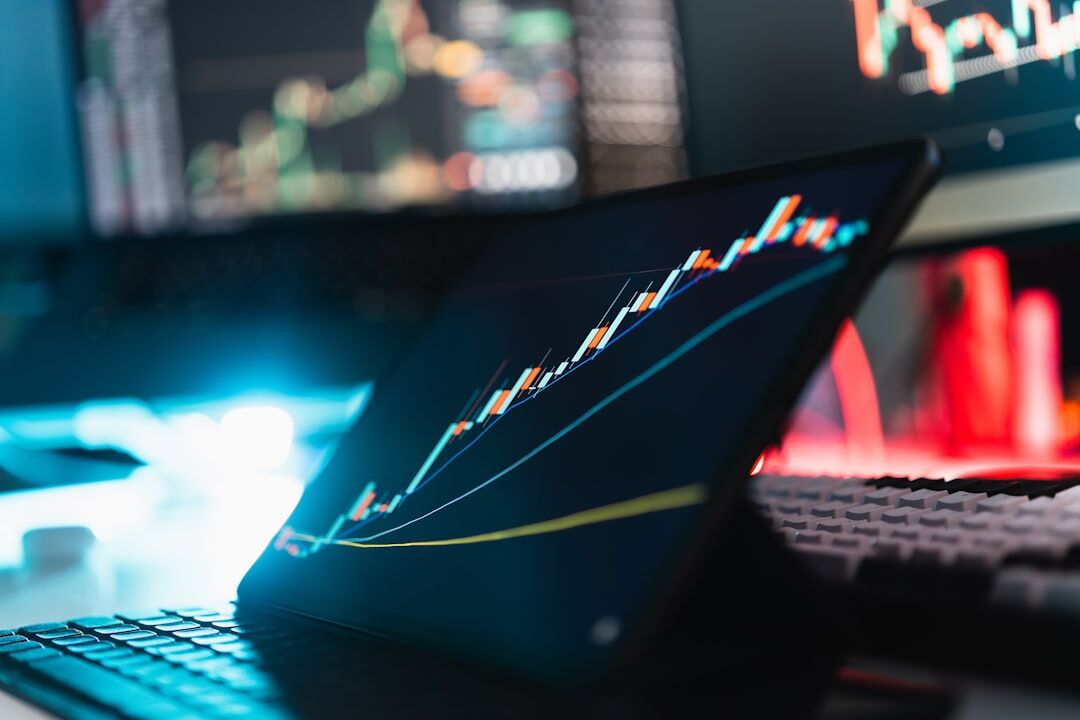 Business analytics dashboard on laptop screen with charts and graphs